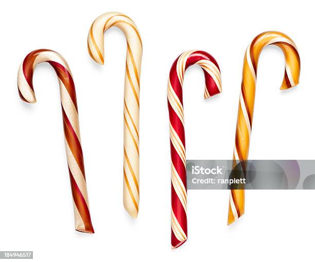 Photo libre de droit de Classic Candy Canes Isolé Tracé De Détourage banque d'images et plus d'images libres de droit de Canne en sucre - Canne en sucre, Confiserie - Mets sucré, Jaune