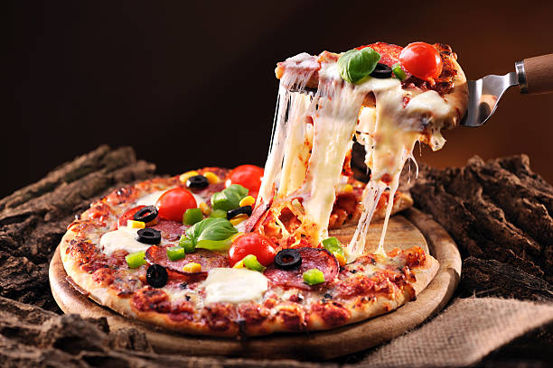 Pizza Pizza with melted cheese basil photos stock pictures, royalty-free photos & images