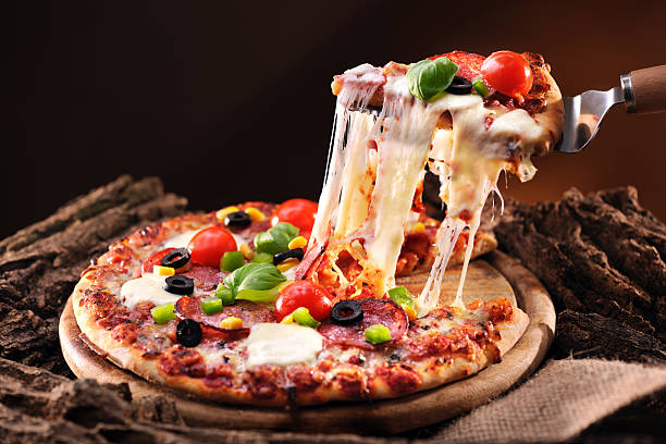 Pizza Pizza with melted cheese Ready To Eat stock pictures, royalty-free photos & images