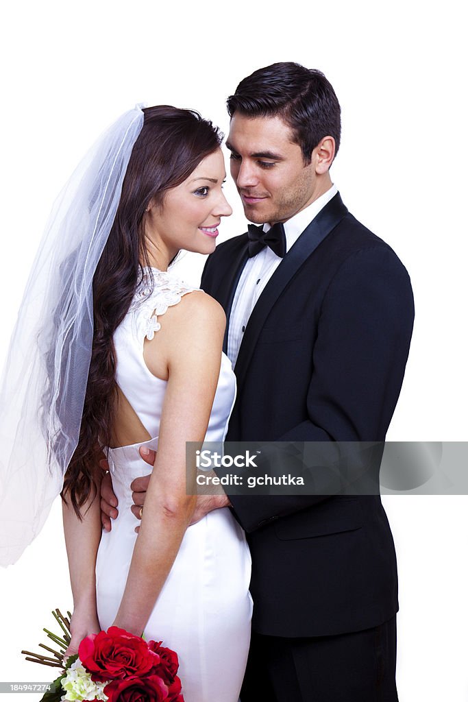 Sposa e lo sposo in piedi - Foto stock royalty-free di Abbigliamento formale