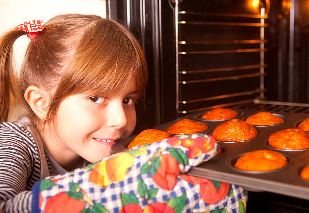 istock Cute young girl baking 184947562