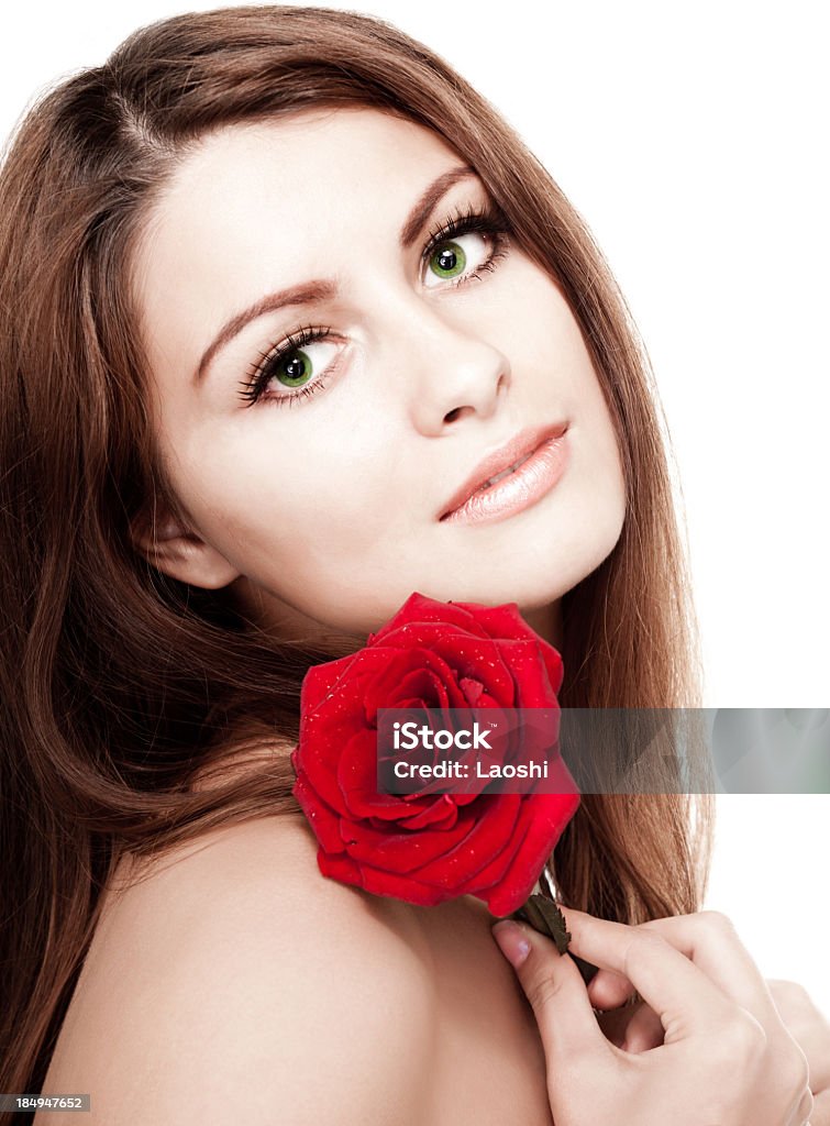 Natural Beauty Lady with the rose and beautiful makeup. 20-24 Years Stock Photo