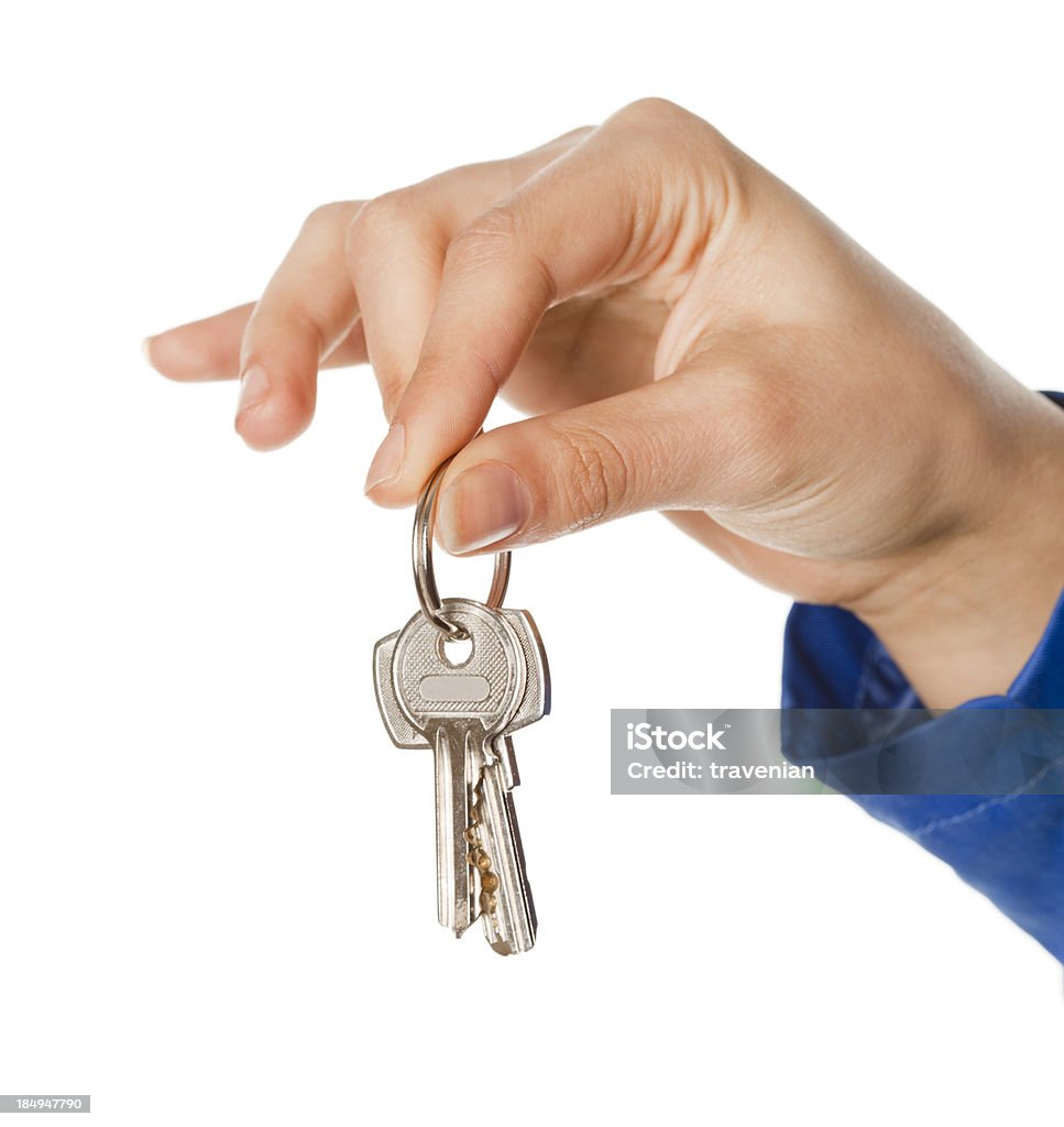 Деловая женщина держит ключ - Стоковые фото К�люч роялти-фри