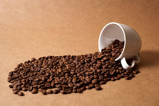 flowing coffee beans stock photo