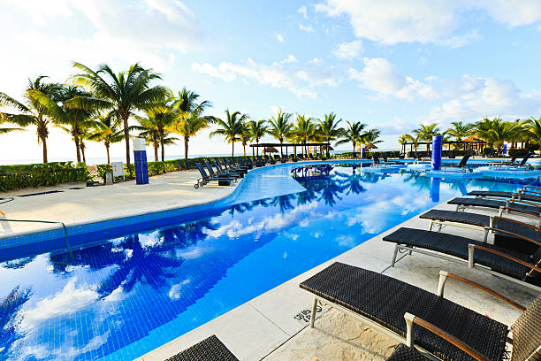 istock Reclining Sun Beds Poolside in Beach Resort, Mexico 184948630