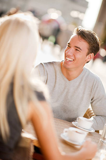 istock Beautiful couple sitting in a cafe 184948891
