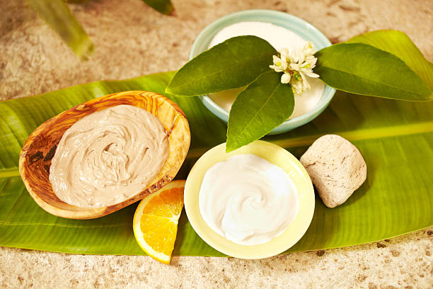 istock Spa still life with mud mask and moisturizer 184949259
