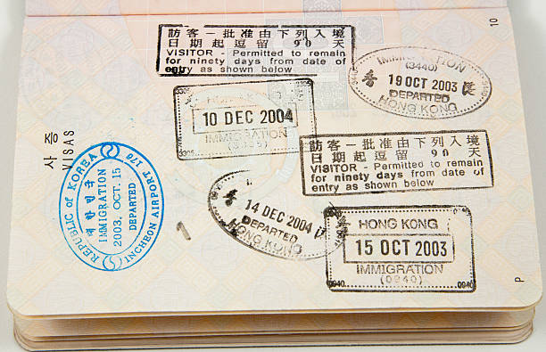 istock Open Korean passport with Asian visas 184949556