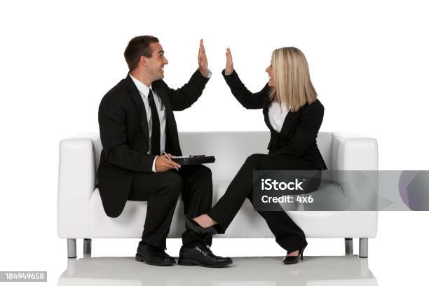 Business Executives Giving Highfive To Each Other Stock Photo - Download Image Now - 20-29 Years, Achievement, Adult