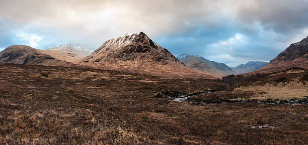 Glencoe and Glen Etive at Sunrise Looking from Rannoch Moor across the River Etive to the mountains at the head of Glen Etive and Glencoe at sunrise. etive river photos stock pictures, royalty-free photos & images