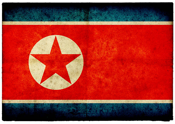 istock Grunge North Korean Flag on rough edged old postcard 184950131