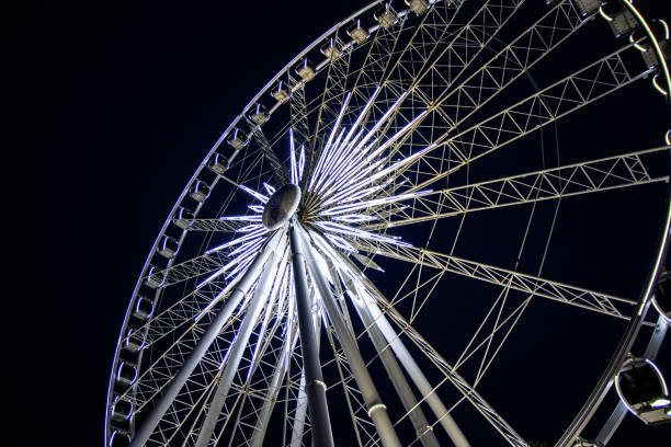 istock A Majestic Ferris Wheel Illuminated Against the Night Sky 1849501460