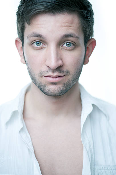 istock young man with white shirt 184950178