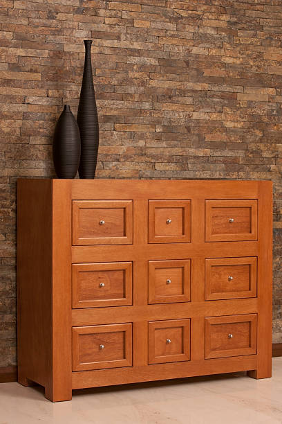 Chest of drawers Hardwood Chest of drawers in contemporary living room chest furniture stock pictures, royalty-free photos & images