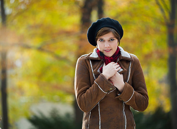 istock Young Woman in Berlin's Tiergarten on a Autumn Day 184950436