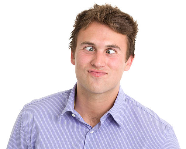 istock Young Man Crossing Eyes Headshot 184950537