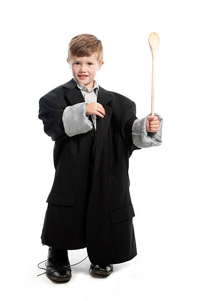 istock Little boy holding wooden spoon 184950573
