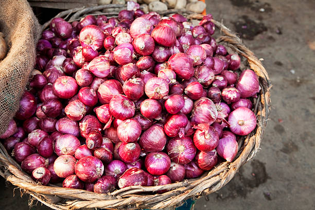 istock red onions in basket on market 184951068