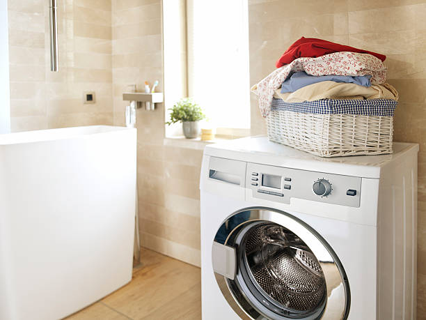 istock White washing machine in the bathroom 184951365