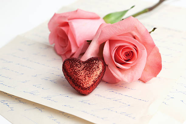 istock Pink roses and red heart 184952292