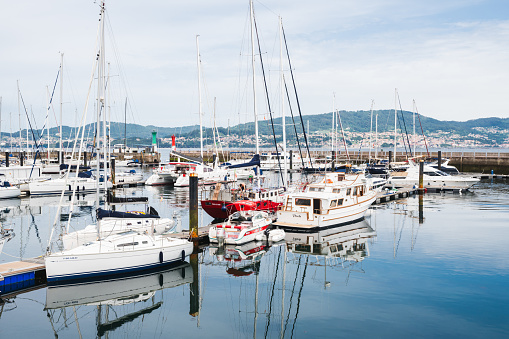 Vigo, Spain - July 5 2023: Boats moored in Vigo port, Pontevedra, Galicia, Spain is the biggest fishing port in the world, selective focus
