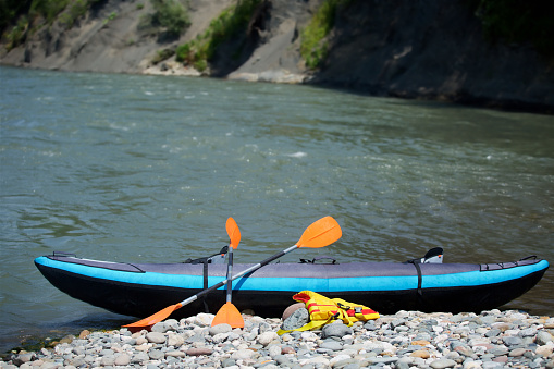 Kayak for rafting on a mountain river, an active sport. Tourism and extreme recreation.