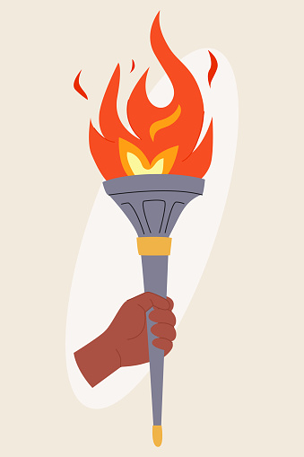 Concept of sports. Hand holds the flame.
