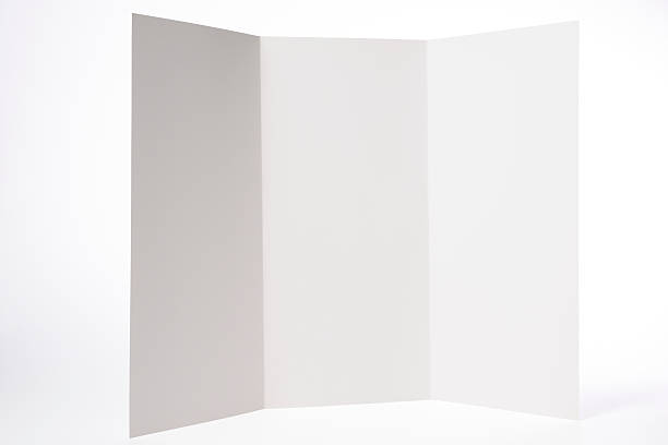 istock Isolated shot of opened white blank booklet on white background 184953424