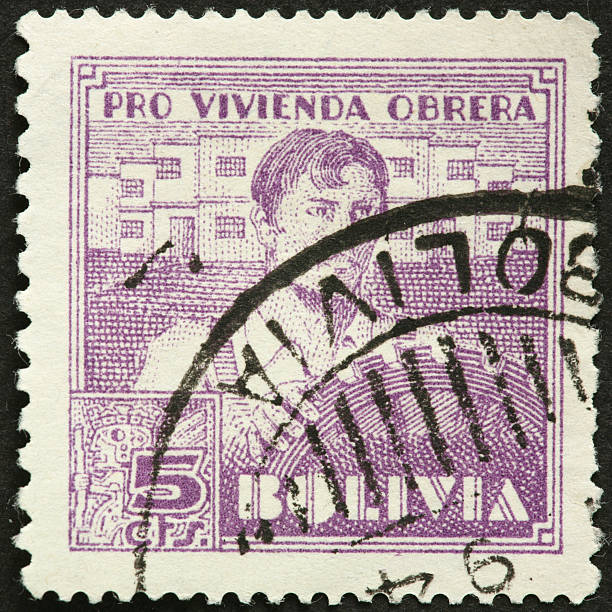 istock man with large gear on a Bolivian postage stamp 184953565
