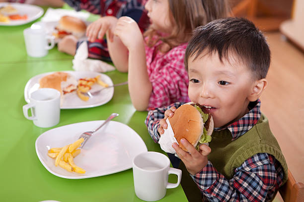 istock Little Boys and Hamburger 184953740