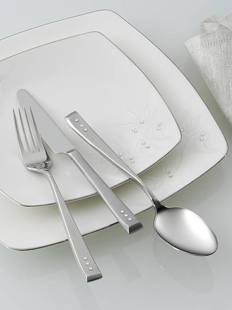 istock Elegant fork, knife, spoon and plate set 184954165
