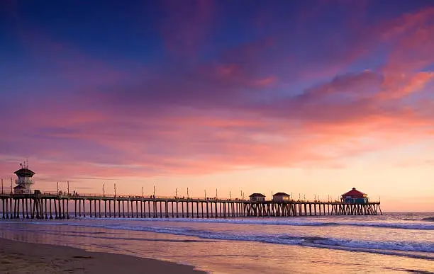 Sunset at the beach and view of the Huntington Beach Pier