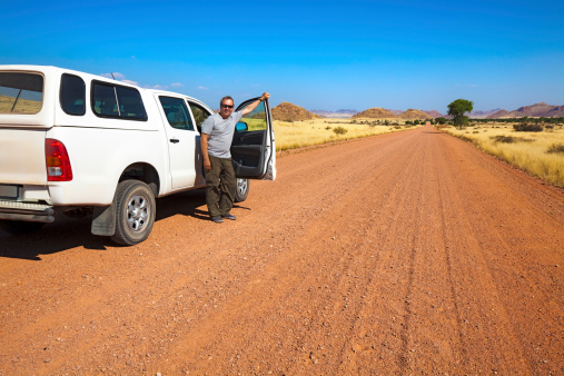 Tourist on self-drive holiday in Namibia