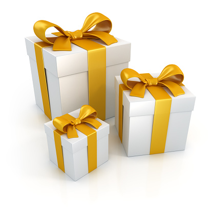 Three white gift boxes with gold ribbons isolated on white background. Digitally generated image. 