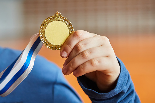 The award is a medal for winning the competition. The concept of sports, a healthy lifestyle and the desire to win.
