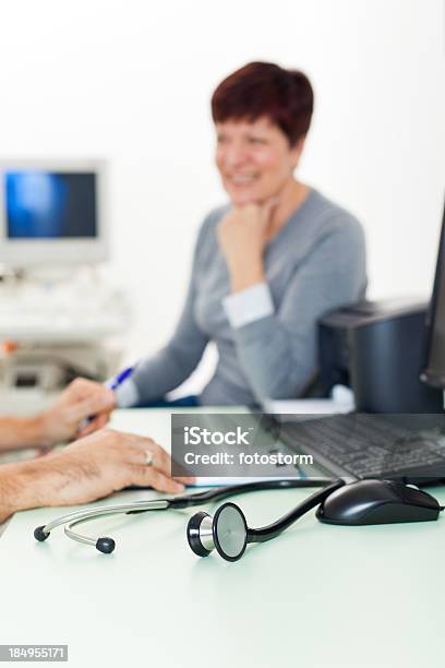 Doctor And Patient Talking About Ultrasound Medical Exam Stock Photo - Download Image Now