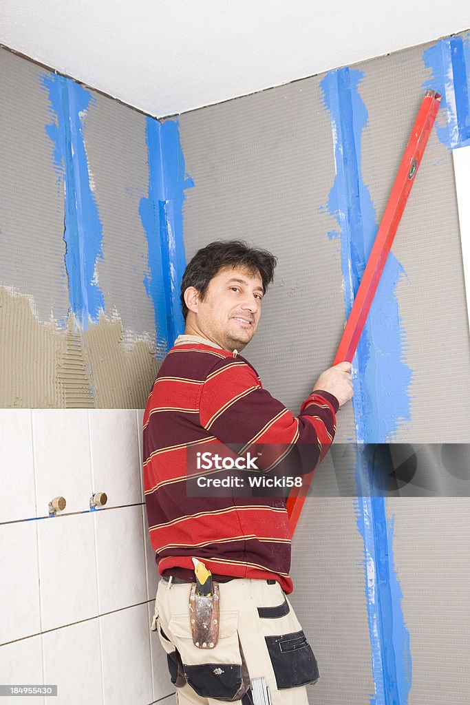 Tile Setter Powder Friendly Tile Setter At Work Stock Photo - Download Image Now - Adult ...