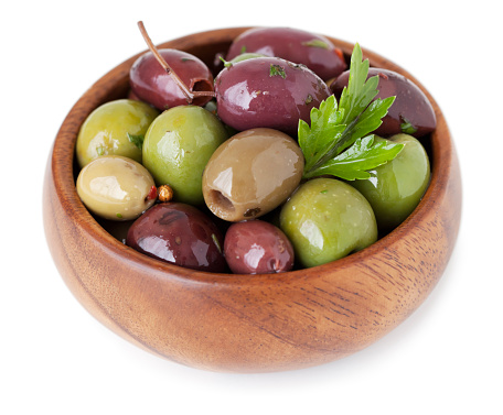 Bowl of olives isolated on white background