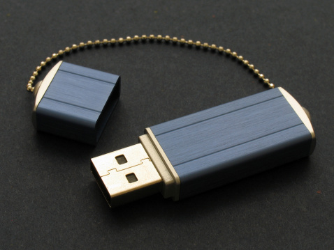 USB memory drive stick on keyboard
