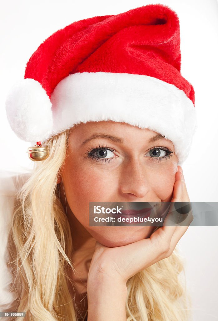 美しい金髪の女性のクリスマスフードにホワイト - サンタクロースのロイヤリティフリーストックフォト