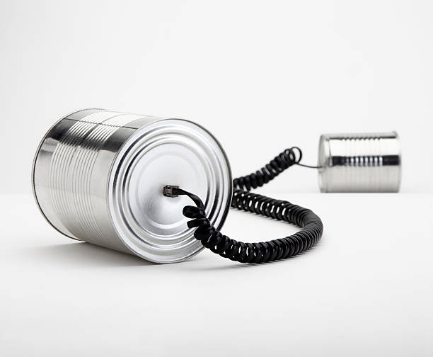 Tin Can Phone - Obsolete Communication stock photo
