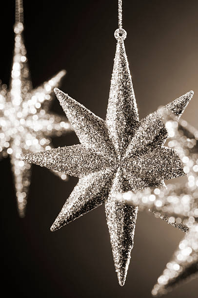 istock Glittering star shaped christmas decorations in silver 184956182