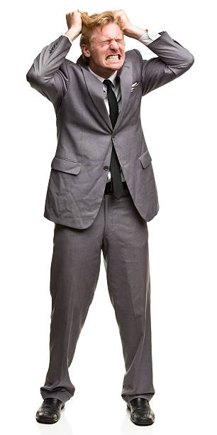 Furious Man in Suit Tearing Out Hair