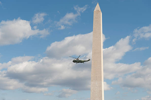 istock USA Helicopter Flies Past the Washington Monument in D.C. 184956589