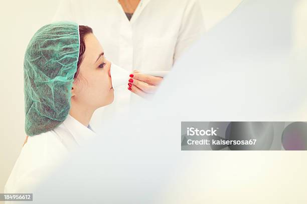 Doctor Or Nurse Helps Her Patient In Inhaling Terapy Stock Photo - Download Image Now