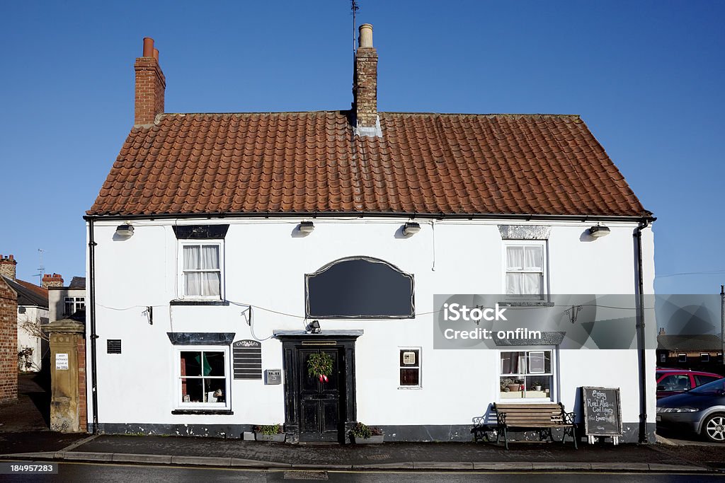 British pub "A typical traditional authentic British pub. This particular building is from the 16th century, and became a Beer House in 1807." Pub Stock Photo