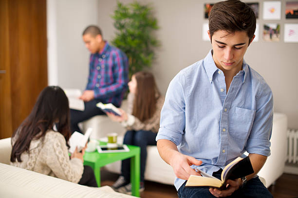 study group teenagers in their common room do some reading bible study group of people small group of people stock pictures, royalty-free photos & images