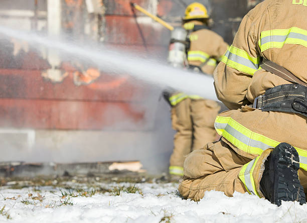 istock Firefighters Battling Winter House Fire 184958060