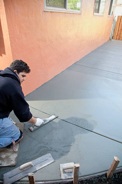 Cement work: Man with Finishing Trowel
