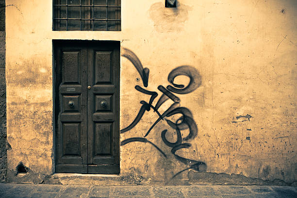 istock Grunge Door and Graffiti in Italy 184959348